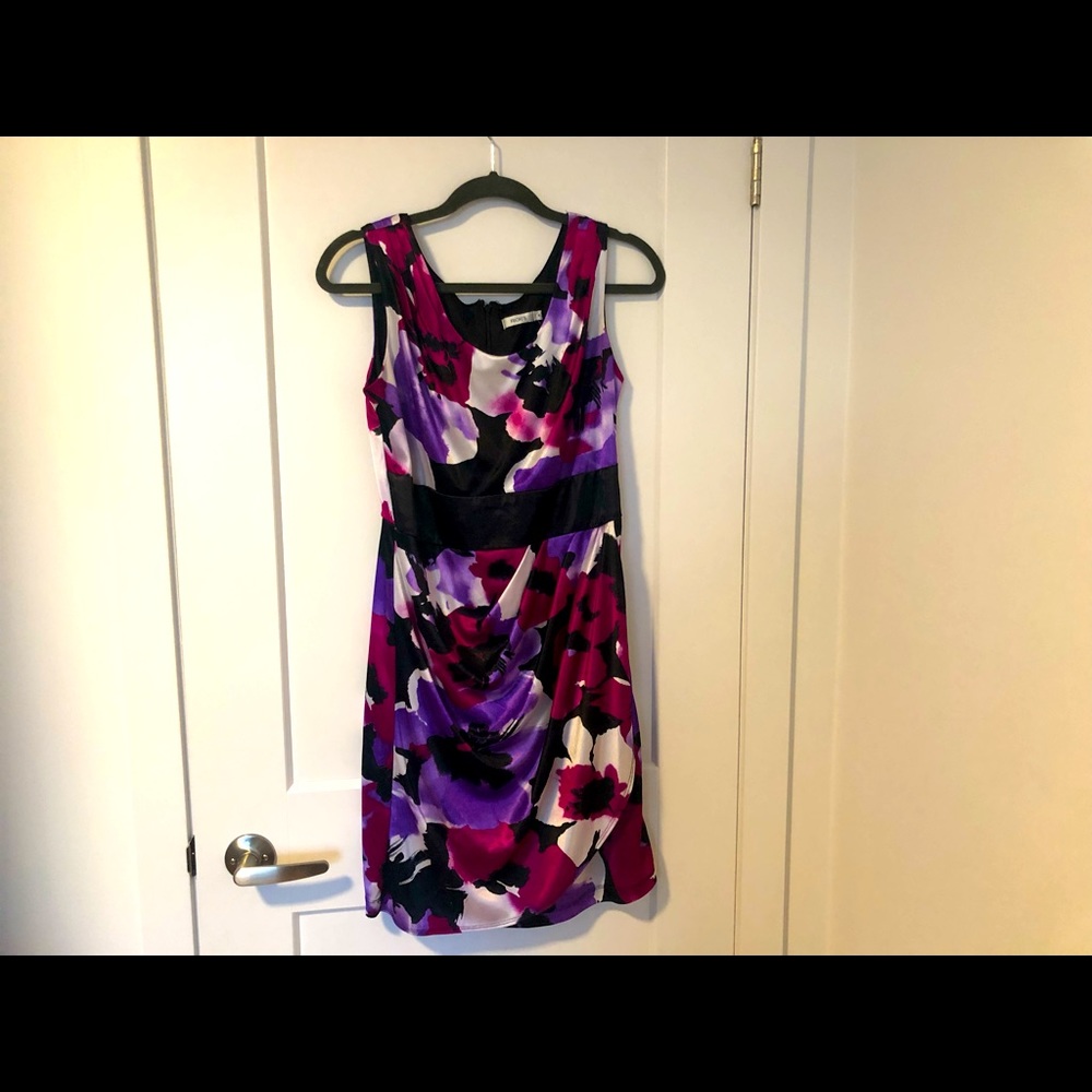 Floral cocktail dress, size 10 from Ricki’s. It fits like an 8.